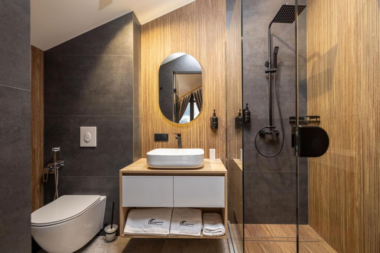 Black & White By Fomich Group